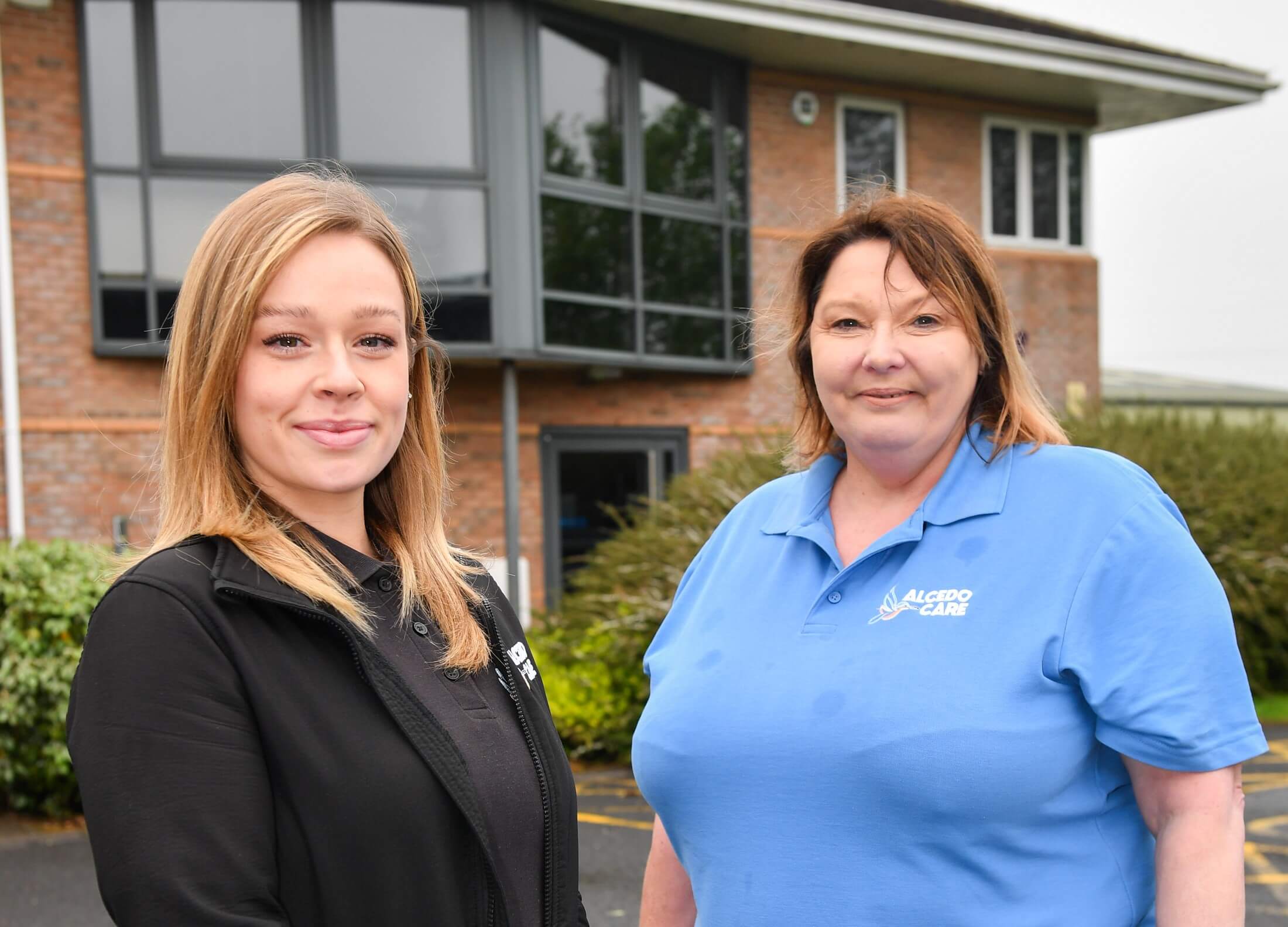 Chelsea-Bryans-Cindy-Cragg-outside-Alcedo-new-Darwen-office