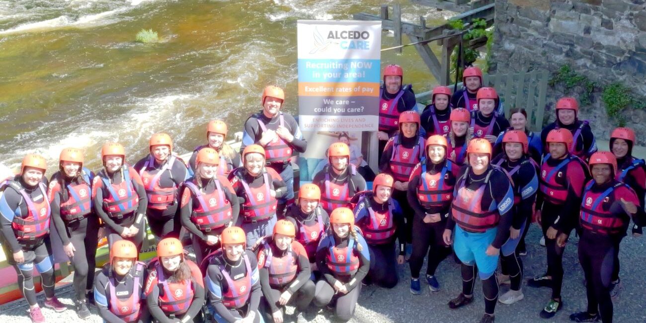 Alcedo Care team doing the White Water Rafting challenge