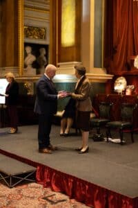 Andy Boardman officially receiving the Princess Royal Training Award from HRH