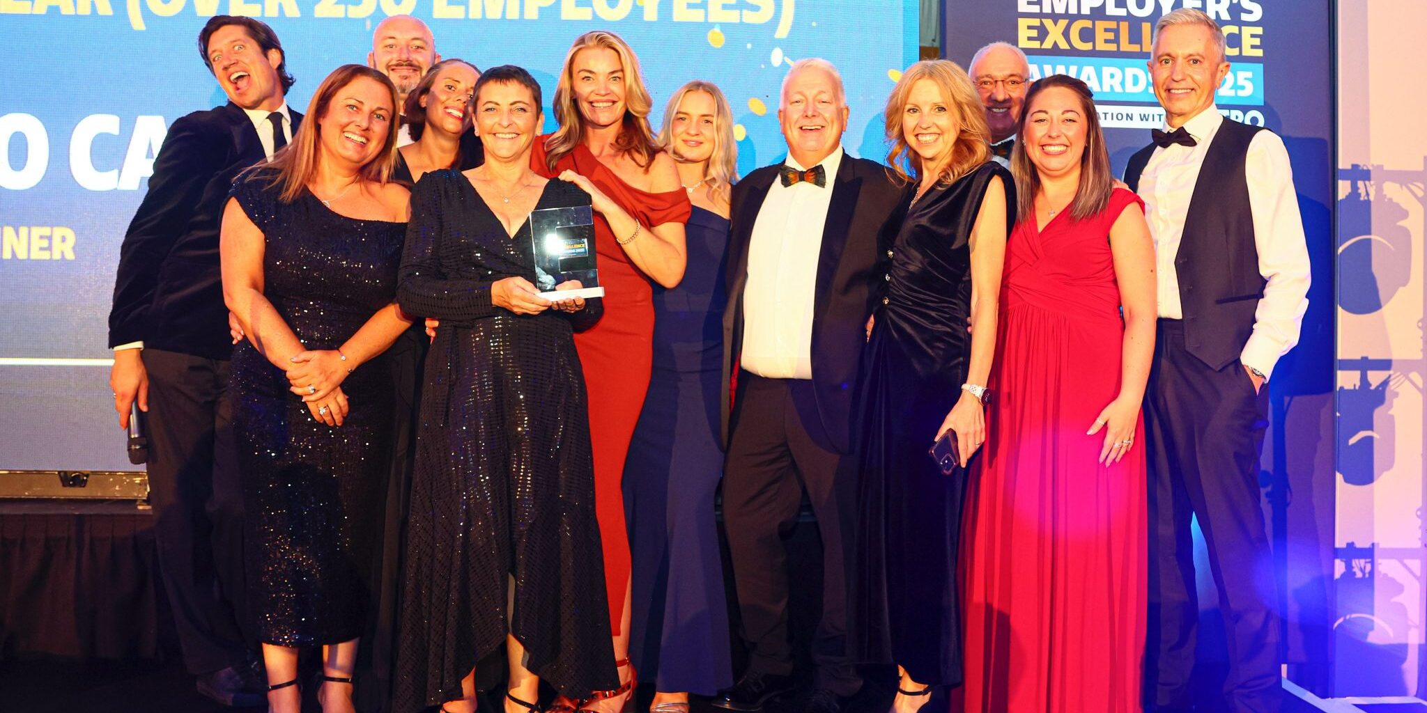 Alcedo Care accepting their Large Employer of the Year award at Employer's Excellence Awards 2025